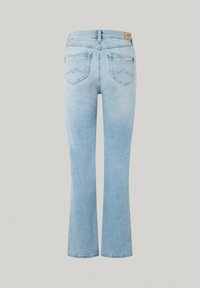 Ljusblå utsvängda denimjeans har en midjehöjd med två bakfickor och subtila vågiga sömmar längs fickans kanter.