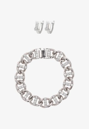 Silver chain bracelet with alternating links, featuring rhinestone accents. Includes matching silver hoop earrings with a textured finish.