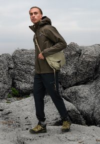 Patagonia TORRENTSHELL RAIN - Vízlepergető széldzseki - dunkelbraun