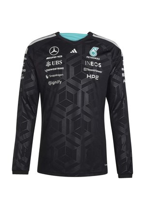 Zwart, langärmelig racetrui met een geometrisch patroon en meerdere sponsornamen, waaronder Mercedes, Petronas, UBS en INEOS op borst en mouwen.