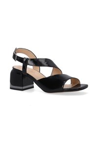 Schwarze Lackledersandalen mit Blockabsatz und offener Zehe. Verfügt über übereinander gekreuzte Riemen und eine verstellbare Knöchel-Schnalle.