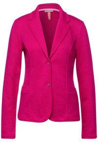Fuchsiový blazer vyrobený z měkké látky, s klopovým límcem, dvěma předními kapsami a dvěma knoflíky pro zapínání. Hladký povrch, propracovaný design.