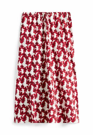 Gonna floreale con sfondo bianco e motivi di fiori rossi, cintura elastica e tessuto leggero e strutturato.