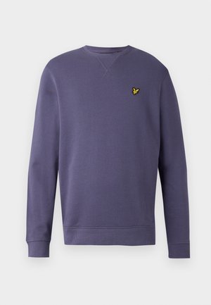 Paarse sweatshirt van katoen, met een ronde halslijn, lange mouwen, geribbelde manchetten en een klein geel geborduurd logo op de borst.