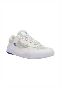 White athletic shoe with mesh and synthetic upper, featuring a blue logo, lace closure, and a textured rubber sole. Design emphasizes breathability.