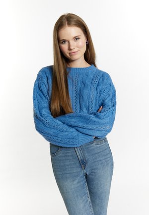- Sweter