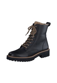 Bottines en cuir noir avec doublure en fausse fourrure marron, bout rond et semelle en caoutchouc robuste. Elles disposent de lacets marron et d'une languette au talon.