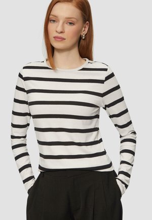 Long-sleeve striped top featuring black and white horizontal stripes, a round neckline, and a fitted silhouette. Smooth fabric texture.