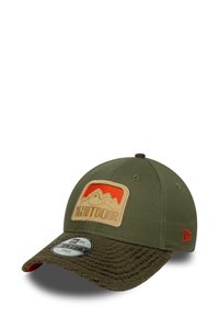 Green baseball cap with a textured brown bill. Features a patch with mountains in red and tan. Constructed from durable fabric.