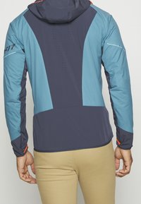 Dynafit Chaqueta de plumas - blue