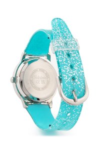 Une montre en silicone turquoise avec un motif pailleté, un dos en acier inoxydable et une boucle en métal. Le bracelet présente plusieurs trous d'ajustement.