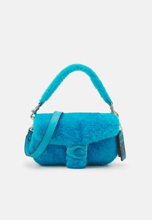 THE LIL NAS X DROP TABBY SHOULDER BAG UNISEX - Kabelka - montero blue