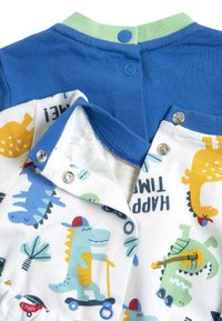Blå bomullsbody med dinosaurtryck, med tryckknappar, rund hals och korta ärmar. Färgglada mönster inkluderar gröna och gula accenter.