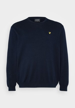 Sweater de malha azul marinho com gola redonda, punhos e barra canelados, apresentando um pequeno logótipo amarelo no lado esquerdo do peito. Textura suave.