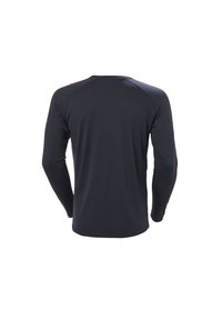 Camisa de manga larga en tejido azul marino oscuro. Presenta una textura suave, cuello redondo y mangas raglán con acentos naranjas contrastantes.