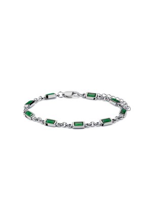 Hopeinen ketjurannekoru, jossa on tasaisesti sijoitettuja suorakaiteenmuotoisia vihreitä jalokiviä ja lukko, valkoisella taustalla.