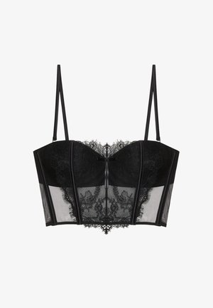Black lace bustier with thin adjustable straps, sheer mesh panels, and floral lace detailing across the front.