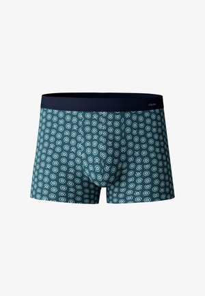 Herrenboxershorts mit einem marineblauen Bündchen, das einen tealfarbenen Hintergrund und ein sich wiederholendes hexagonales Muster in Weiß und dunklerem Teal aufweist.