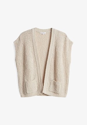 Beige, textured cardigan with a open front, two patch pockets, and a ribbed design. Features no sleeves and a relaxed fit.
