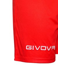 Rde športne hlače iz gladkega materiala, ki imajo belo vezeno GIVOVA logo na spodnjem robu.