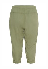 Olive green, lightweight, tapered pants with an elastic waistband and fitted cuffs. Smooth texture with side pockets and subtle seams.