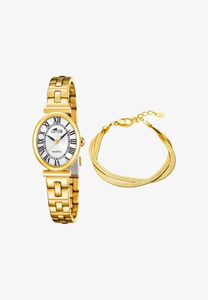 Zlatni Lotus kvarcni ručni sat s rimskim brojkama i odgovarajućom višestrukom zlatnom narukvicom s kopčom u obliku škampa na bijeloj pozadini.