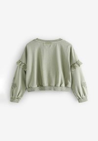 Helle grüne, kurze Sweatshirt mit einem gerippten Rundhalsausschnitt, Ballonärmeln, Spitzenbesatz und floralen Stickereien an den Ärmeln.