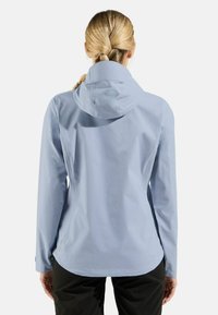 Light blue waterproof jacket with a hood, long sleeves, and a slightly curved hem. Smooth texture and minimal design with no visible hardware.