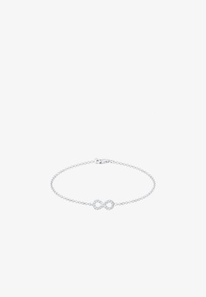 Sølv kædereg bracelets med et uendelighedssymbol prydet med små klare sten for ekstra glans. Minimalistisk design med låselukning.