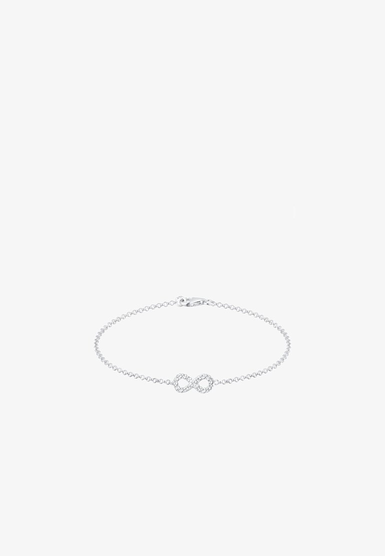 Silberne Kettenarmband mit einem Unendlichkeitssymbol, das mit kleinen klaren Steinen verziert ist, um zusätzlichen Glanz zu verleihen. Minimalistisches Design mit einem Verschluss.