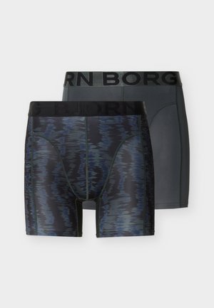 Boxer en matière lisse et légère, à motif abstrait bleu foncé et noir, doté d'une ceinture élastique noire et d'une coupe ajustée.