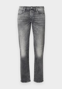 Jeans de mezclilla gris con corte recto, que presentan una textura deslavada, diseño estándar de cinco bolsillos y cierre de botón.