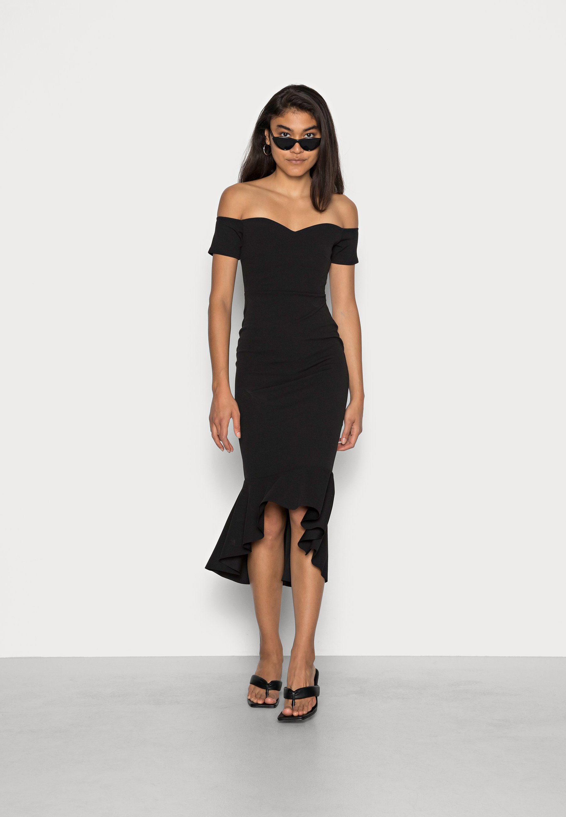 white aline dress with sleeves