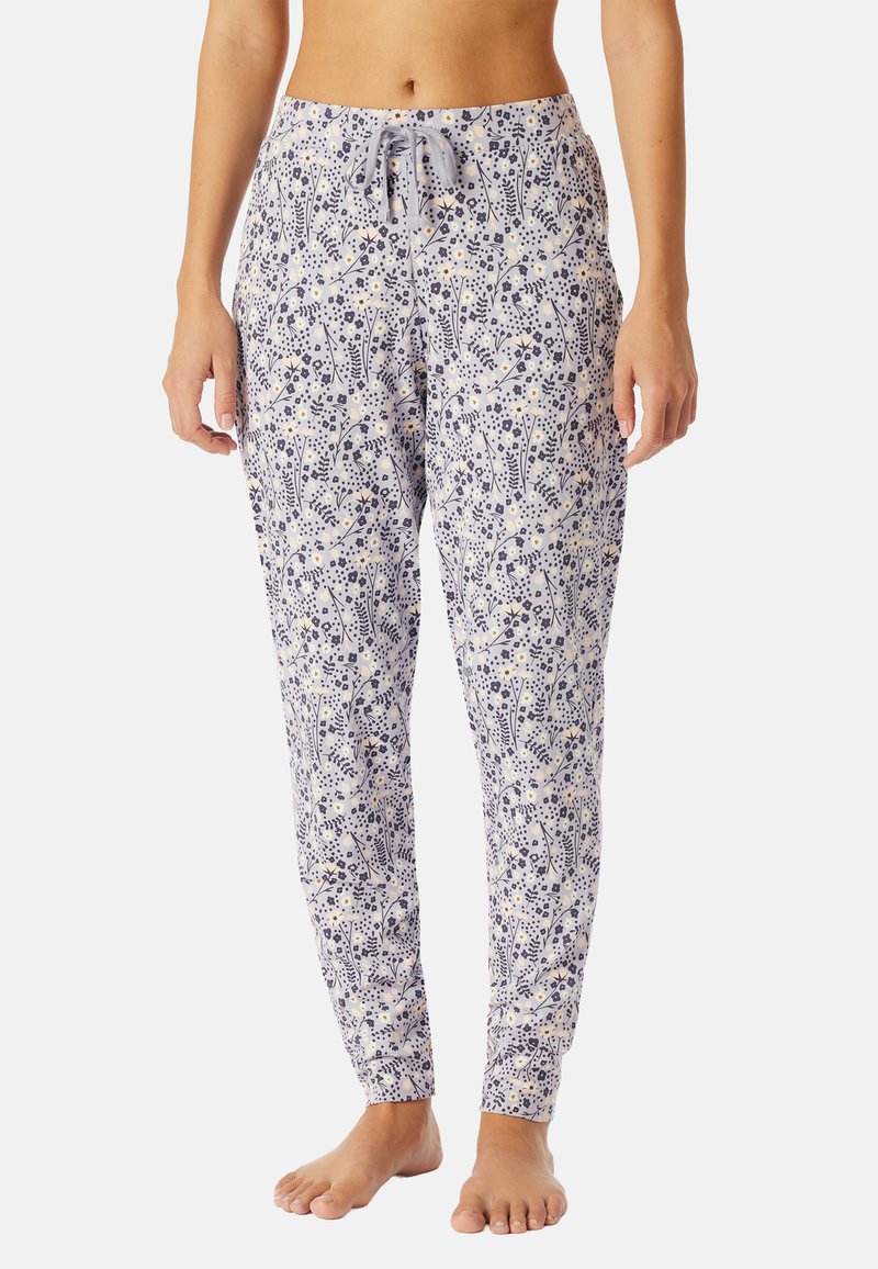 lichte, gemusterde loungebroeken in lavendel met bloemenpatroon. Voorzien van een trekkoord in de taille en taps toelopende benen. Zachte stof.