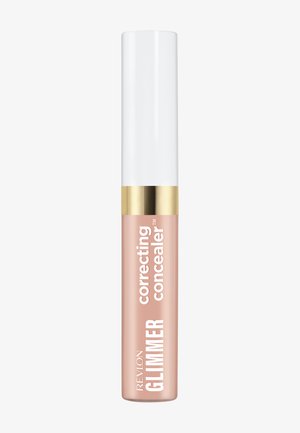 Correcteur correcteur Revlon Glimmer dans un tube beige clair avec un capuchon blanc et une bande d'accent dorée, étiqueté pour la couverture de la peau.