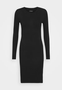 Schwarzes, geripptes Strickkleid mit langen Ärmeln, rundem Ausschnitt und enganliegender Silhouette. Weicher Stoff und knielanges Design ohne sichtbare Hardware.