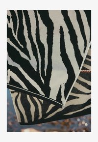 Unselected, zebra monochrome