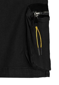 Black fabric joggers featuring a side pocket with a zip closure and yellow drawstring accents. Smooth texture with a casual design.