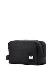 Borsa da viaggio per articoli da toeletta in nylon nero, di forma rettangolare, con chiusura a zip, maniglia laterale e una piccola etichetta applicata sul davanti.