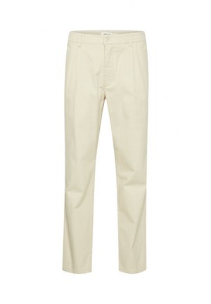 Beige cotton trousers with a straight fit, featuring an elastic waistband, front pleats, and a single button closure. Smooth texture, no patterns.