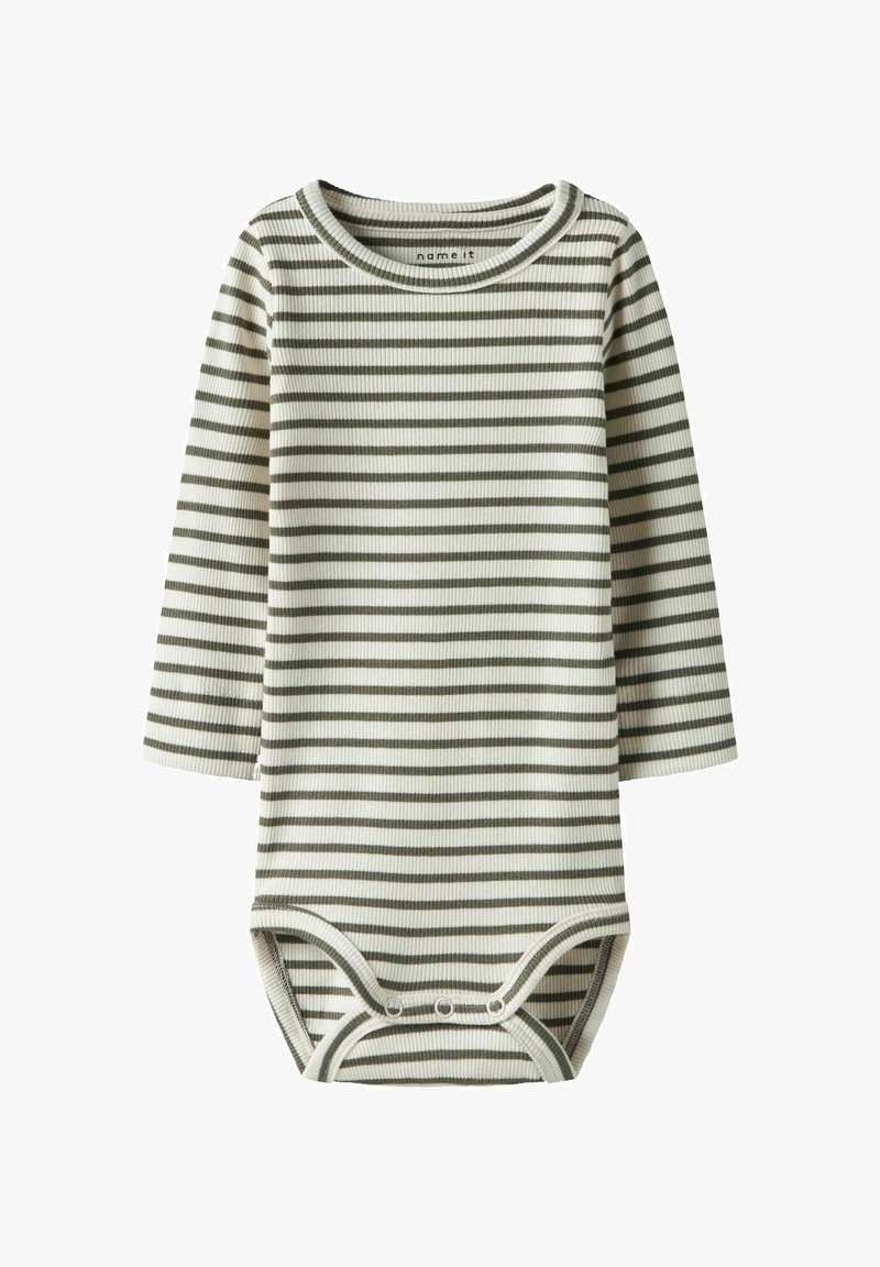 Ilgas rankovės bodis kreminės spalvos su alyvuogių žalumo horizontaliomis juostelėmis. Pasižymi minkšta raibomis tekstūra ir užsegimais apačioje.