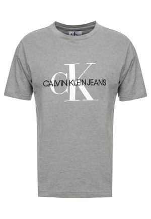 Grey cotton t-shirt featuring short sleeves, a crew neckline, and front print with "CALVIN KLEIN JEANS" and a large "CK" logo in white.