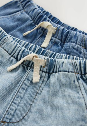 Džinsu šorti divos zilā toņos ar elastīgu vidukli un auklu. Apakšdaļa gaiši zila, augšdaļa tumši zila.