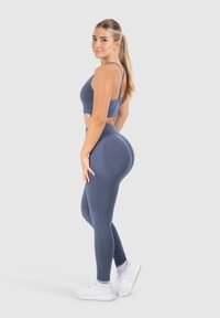 Smilodox SCRUNCH EFFECT SOLID LEGGINGS SPORT FITNESS - Leggings - blau