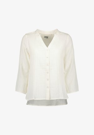 Biała bluzka z długim rękawem wykonana z tkaniny o fakturze, z dekoltem w serek, zapięciem na guziki z przodu oraz lekko zaokrąglonym dołem.