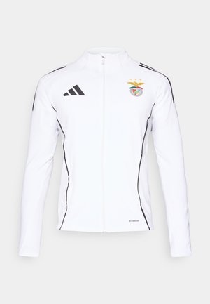 Weißer Blouson mit Reißverschluss, schwarzen Akzenten und Adidas-Logo. Mit einem Teamwappen mit zwei Sternen, aus weichem Stoff mit glatter Textur.