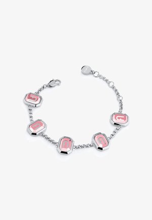 Nerūsējošā tērauda aproce ar rozā sešstūra akcentiem un spīdīgu apdari. Iespējota ķēdes posmu dizains un omāra skavu aizdare.