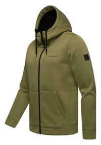 Olive green zip-up hoodie made of ribbed fabric with a large hood, black lining, front pockets, and logo patch on the left sleeve.