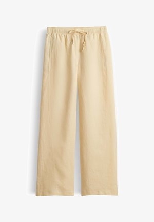 Pantalon beige à jambes larges avec taille élastique et cordon, fabriqué en tissu léger, adapté pour un port décontracté.