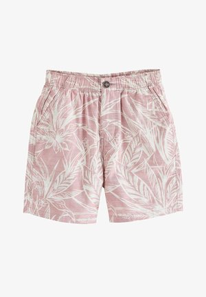 Różowe bawełniane szorty z nadrukiem białych liści tropikalnych i kwiatów, elastyczna talia, zapięcie na guzik oraz boczne kieszenie z przodu.